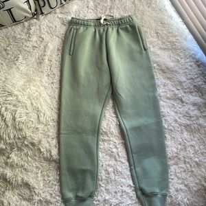 Woman’s sweat pants sage green color.